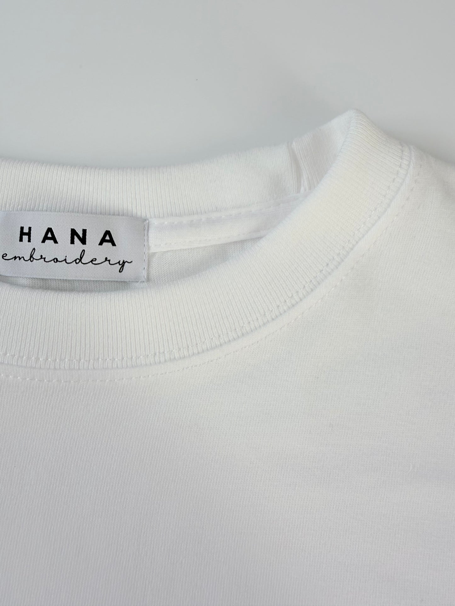 ポメラニアンのワンポイント刺繡ロングTシャツ(オレンジ)